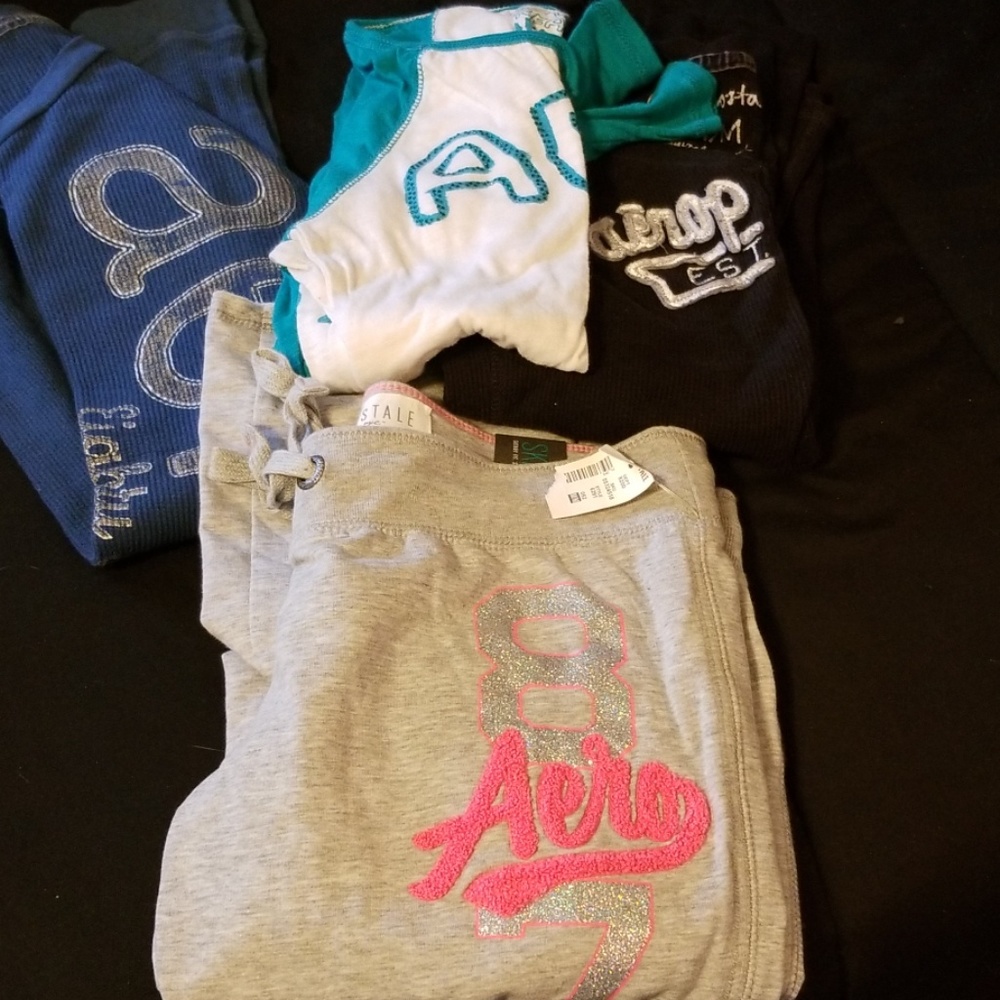 Lot of long sleeve tees and sweat pants